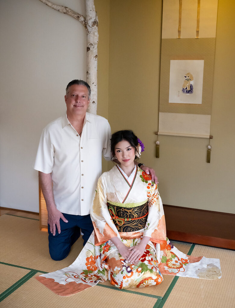 Father and daughter recreating a childhood pose during a seijin celebration kimono photo shoot in Los Angeles