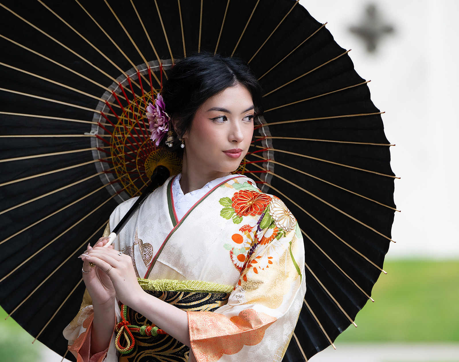 Young woman wearing a traditional kimono during her seijin photo shoot in Los Angeles